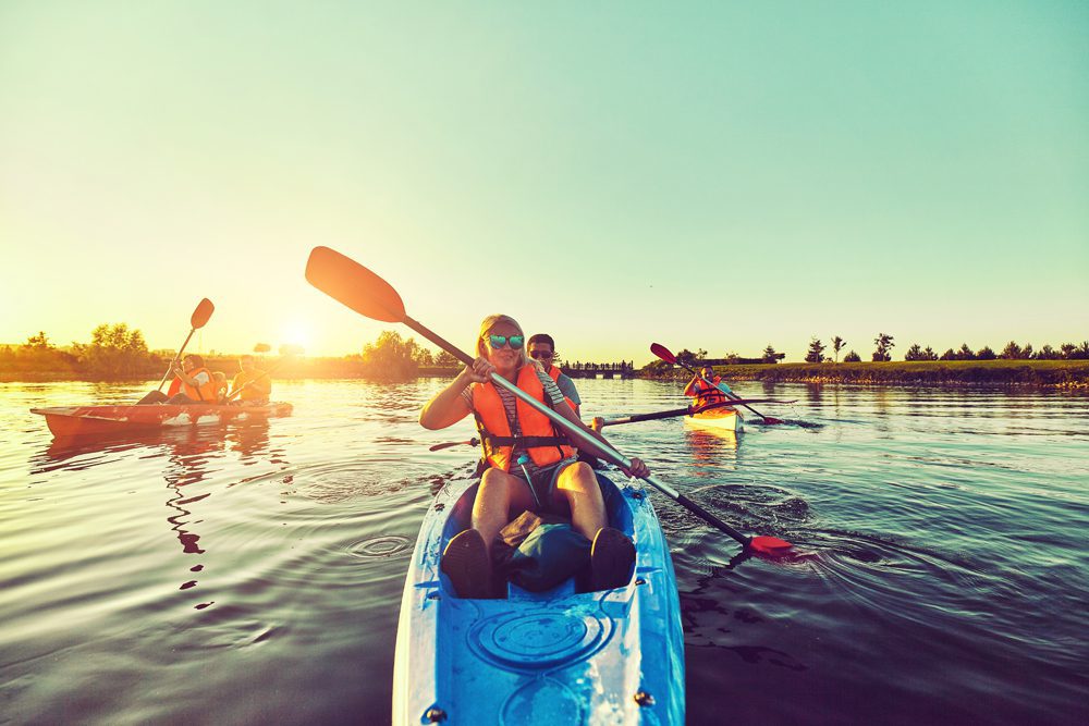 Wild nature and water fun on summer vacation. Camping and fishing.